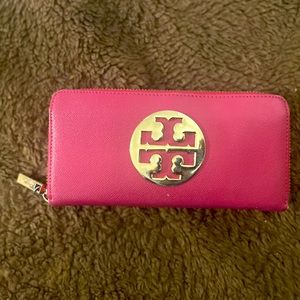 Tory Burch fuschia pink wallet.